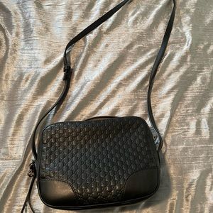 Black GG logo medium crossbody bag with gold hardware